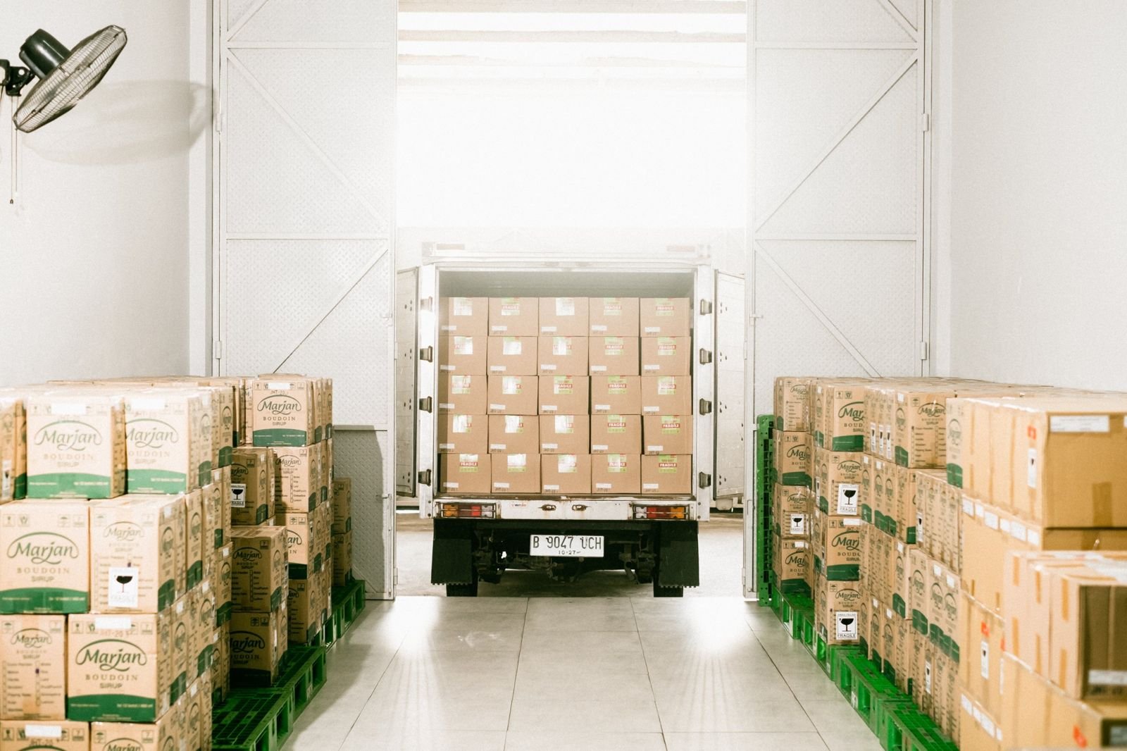 Truck loaded with cartons at the warehouse door